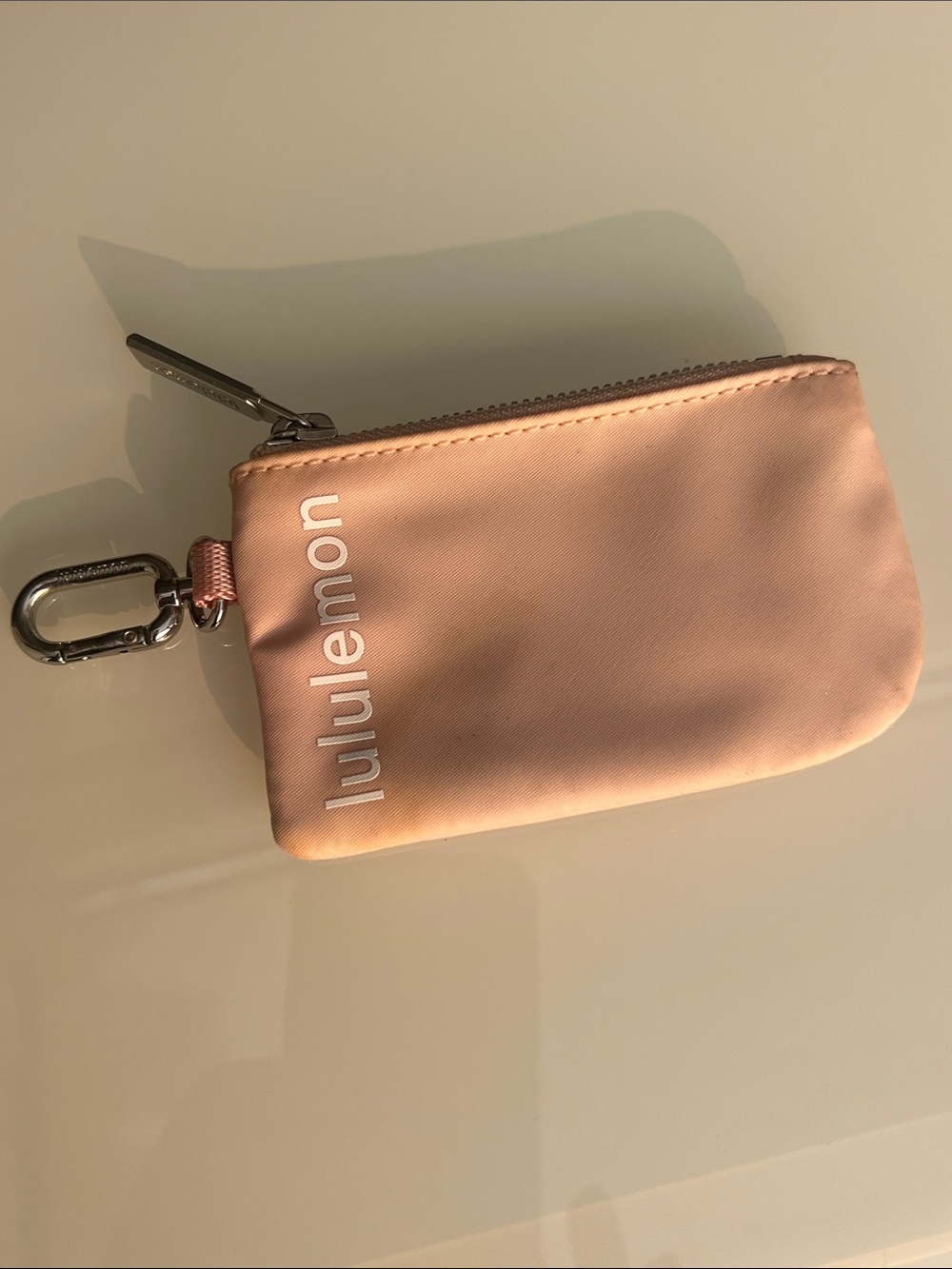 lululemon pink key pouch with silver hardware